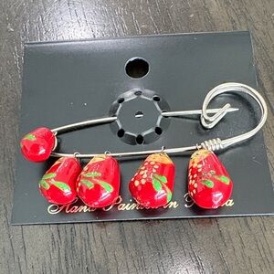 Vibrant Red Floral Brooch with Silver Accents
